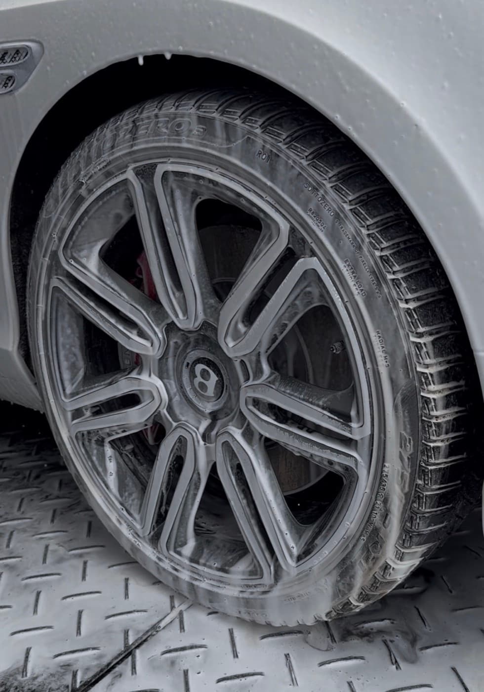 Bentley wheel and tire foam-washed