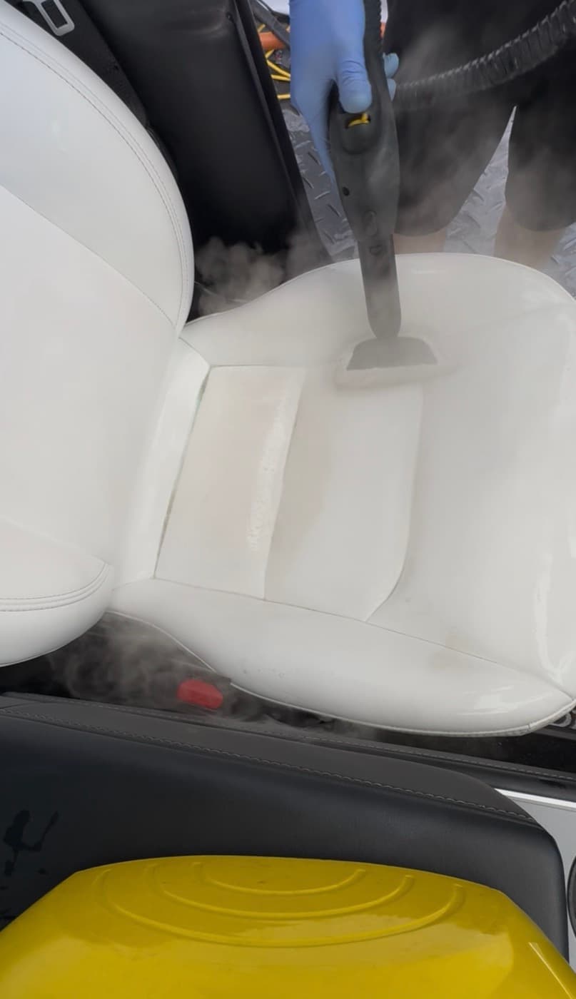 Steam cleaning a light leather seat